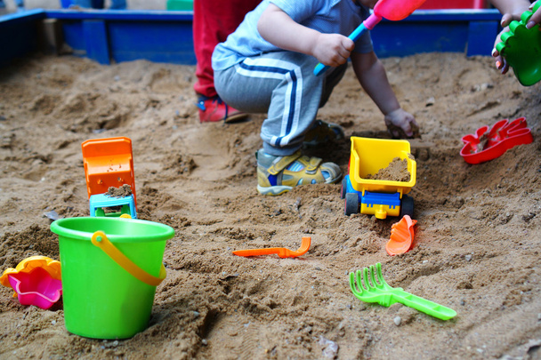 children's toys in the sandbox - Fotó, kép