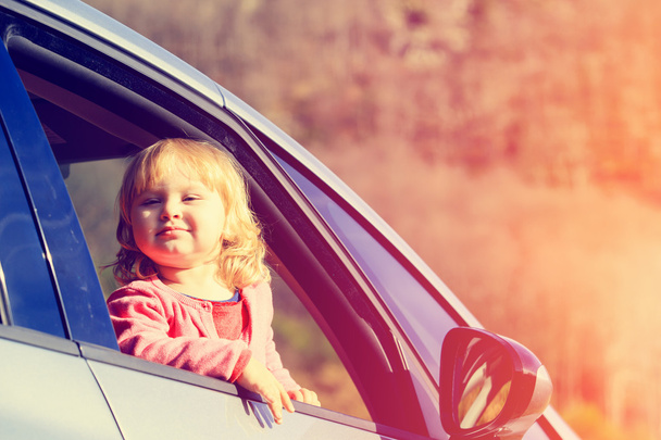 happy little girl travel by car - Fotó, kép