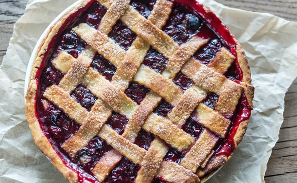 Cherry pie on the wooden background - Photo, Image