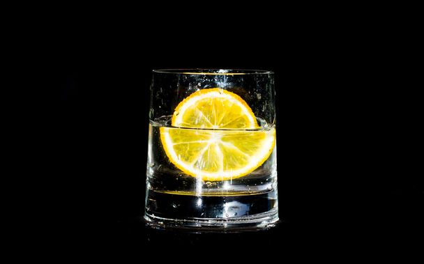 Glass of cocktail  with orange - Foto, afbeelding