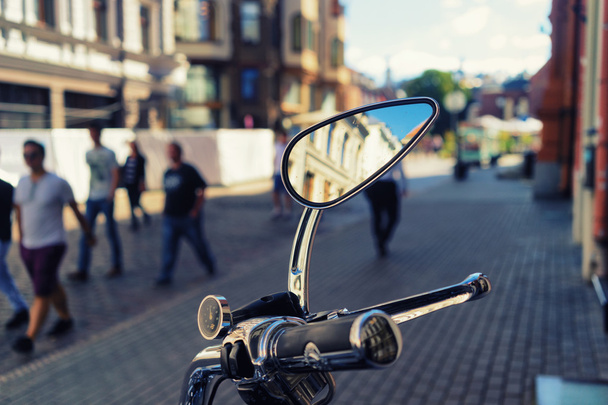 The mirror of a parked motorcycle - Фото, изображение
