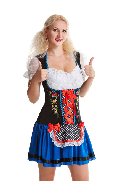 Beautiful young blond girl of oktoberfest beer stein - Photo, image