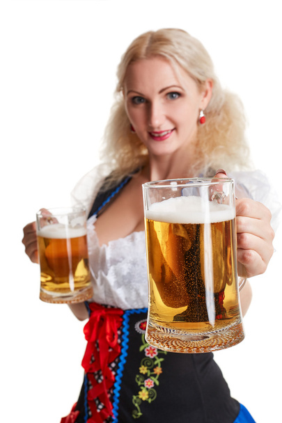 Beautiful young blond girl of oktoberfest beer stein - Foto, Bild