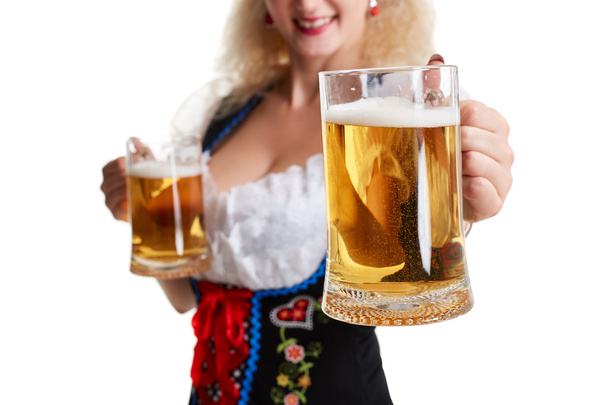 Beautiful young blond girl of oktoberfest beer stein - Foto, Imagen