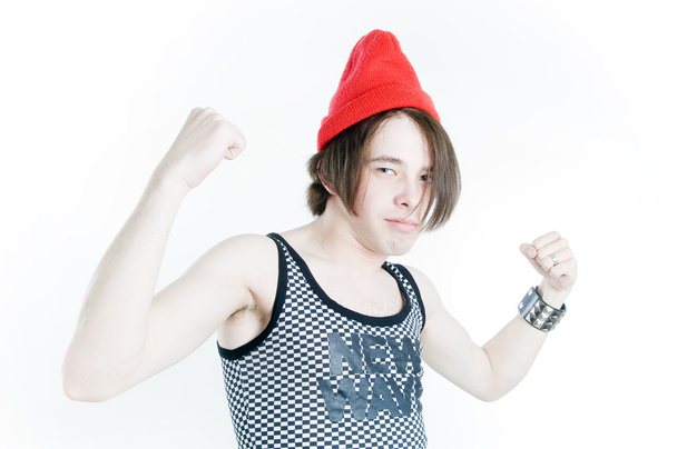 Funny emotional teenager in red hat - 写真・画像