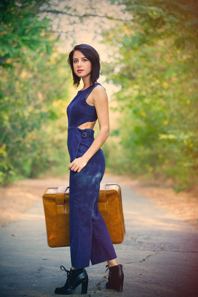 young woman with suitcase - Photo, Image