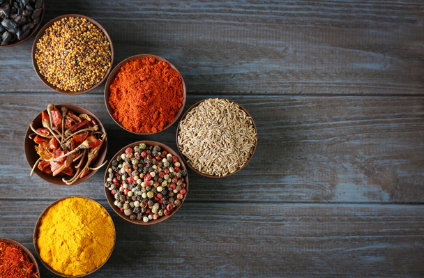 Different spices in bowls   - Фото, зображення