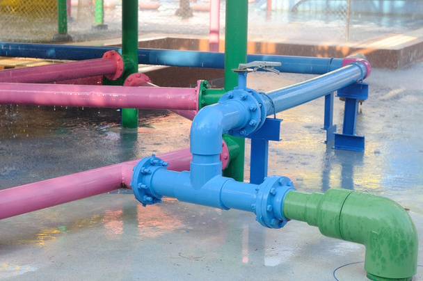 Kleurrijke waterleidingen leidingsysteem. - Foto, afbeelding