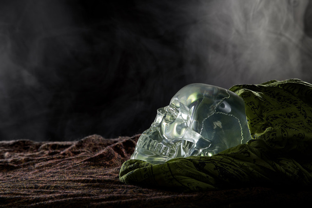 Crystal Skull on Smoky Background - Foto, Imagen