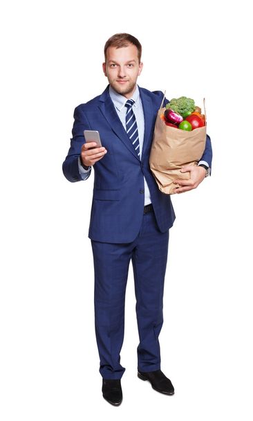 Businessman with healthy food, grocery buyer isolated - Foto, afbeelding