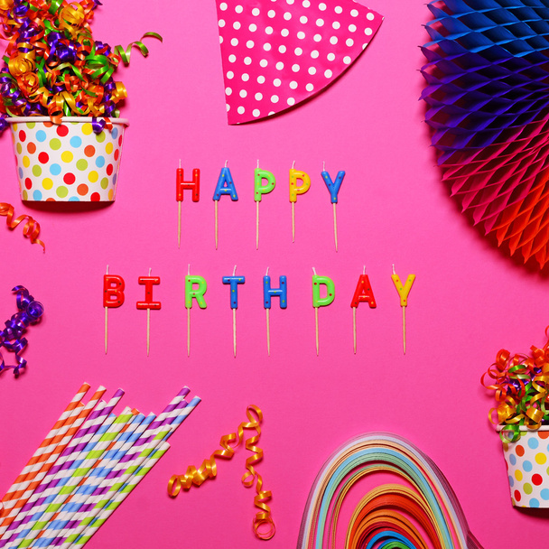Happy Birthday flat lay with party decorations on pink backgroun - Fotó, kép