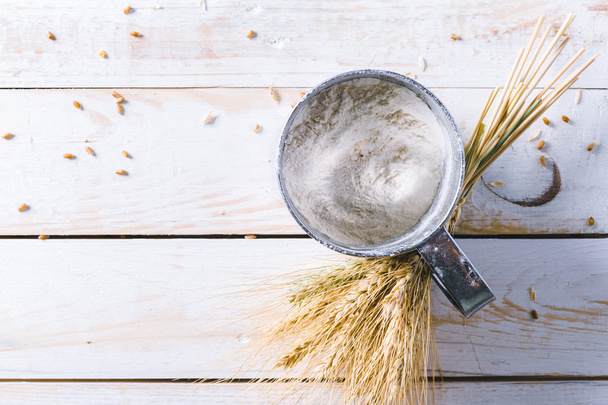 wheat and mug on white background - Foto, Imagen