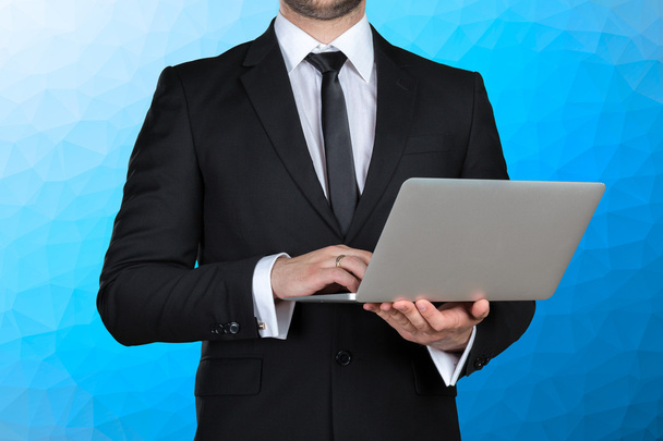 businessman holding laptop - Foto, Imagen
