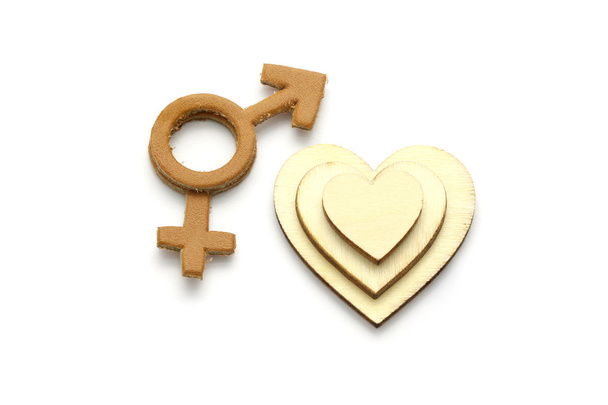 Men and Female with love abstract symbol made of leather isolated on white background - Photo, Image