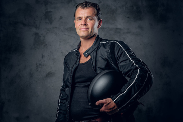 Middle age biker in sports jacket - Photo, Image