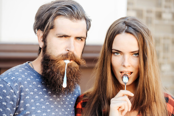 young couple with tea spoon - Fotografie, Obrázek