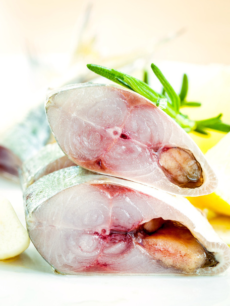 Fresh cutting Mackeral in olive oil with garlic and rosemary on  - Photo, Image