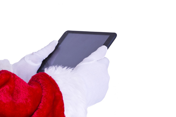 santa claus with tablet - Foto, afbeelding