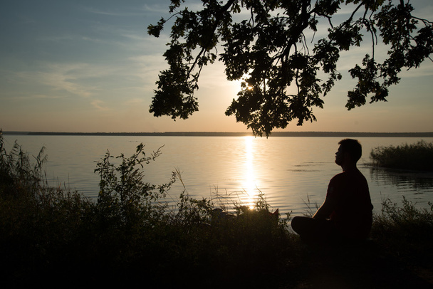 Jezioro zachód słońca człowieka - Zdjęcie, obraz