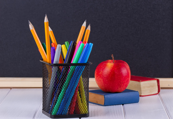 Background blackboard chalk, books, pencils and apple - Photo, Image