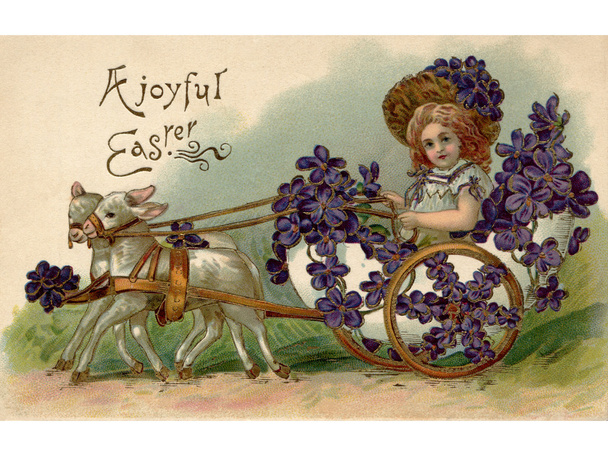 A vintage Easter postcard of a girl riding in a wagon full of vi - Photo, Image