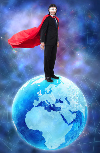 Homem com superpoderes dominando o mundo
 - Foto, Imagem
