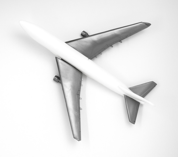dessus en plastique blanc de jouet d'avion d'air sur fond blanc
 - Photo, image