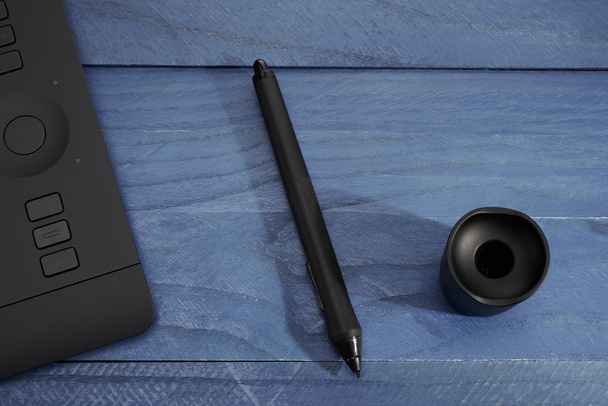 чорна ручка з професійного графічного планшета
 - Фото, зображення