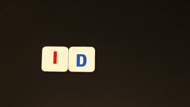 The word idea (bad idea) made up of letters. Word idea (bad idea) on the black background. Stop motion - Кадри, відео