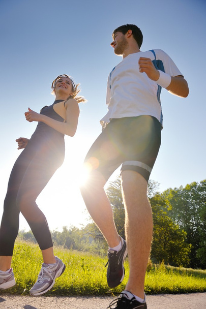 Young couple jogging - Foto, imagen