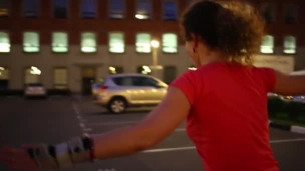 woman roller skating on street - Felvétel, videó
