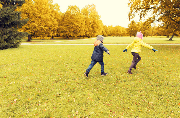 group of happy little kids running outdoors - Foto, Imagen