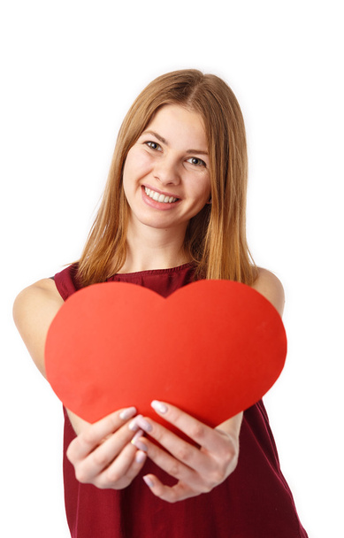 Girl Holding a Big Red Heart. - Фото, изображение