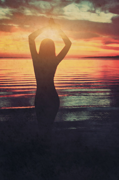 silhouette of young beautiful girl on sunset tropical beach. nat - Photo, Image