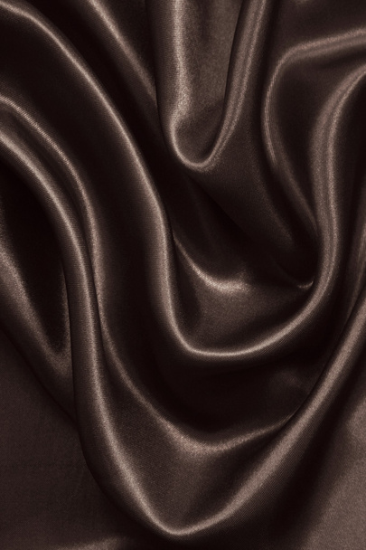 Smooth elegant brown silk or satin as background. In Sepia toned - Zdjęcie, obraz