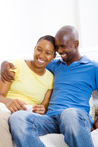 Young happy african american couple relaxing at home - Valokuva, kuva