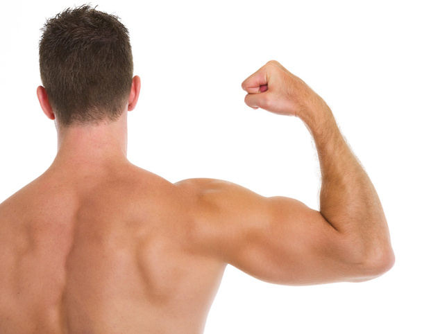 Muscular man showing biceps. Rear view - Fotografie, Obrázek