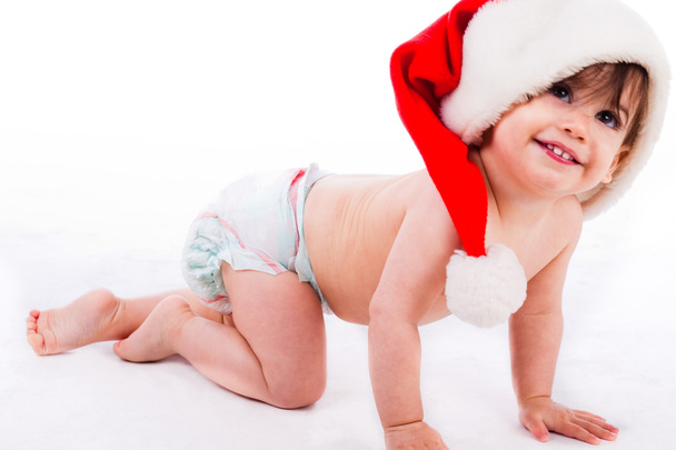 Baby crawling with santa cap - Photo, Image