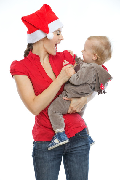 Young mother spending Christmas time with baby - Фото, зображення