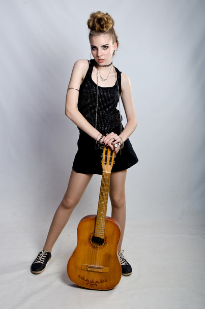 girl playing the guitar - 写真・画像