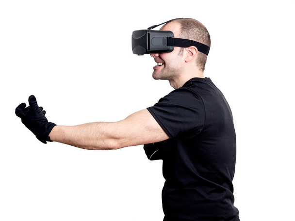 Człowiek z zestaw wirtualnej rzeczywistości, grając w gry wideo - Zdjęcie, obraz