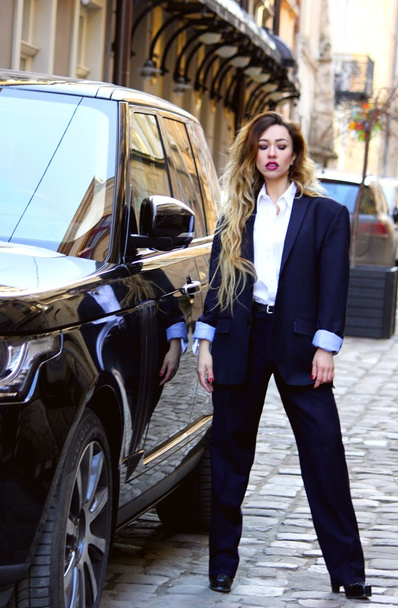 woman standing near black car - Photo, image