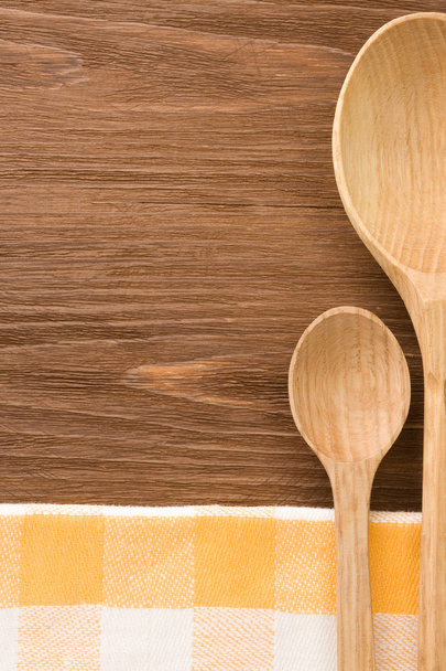 wooden spoon as utensils on table - Фото, изображение