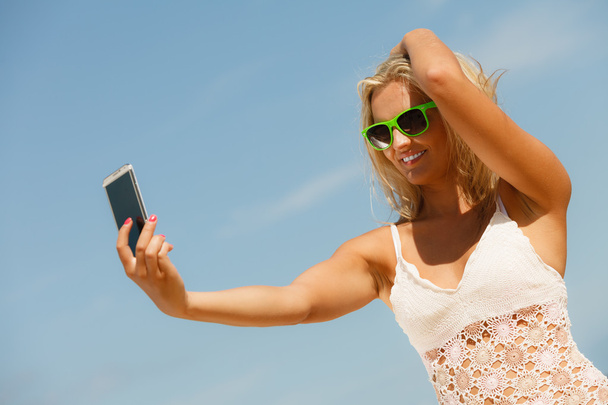 Girl with phone taking selfie. - Photo, Image