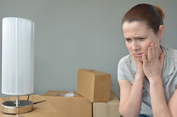 Sad evicted woman worried relocating house - Photo, Image