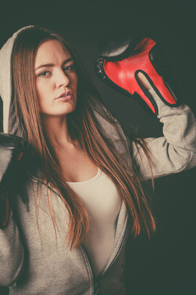 Woman wear boxer gloves with arms in air. - Foto, Bild