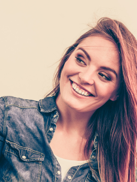 Happy smiling woman wearing jeans - Fotó, kép