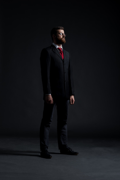 Businessman on black background - Fotó, kép