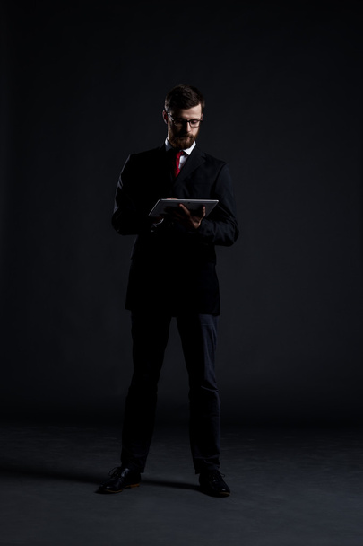 Businessman with tablet computer  - 写真・画像