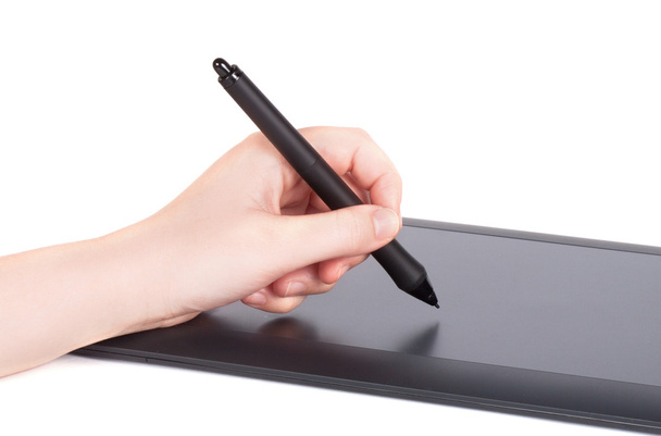Hand is drawing on a digital graphic tablet - Фото, зображення